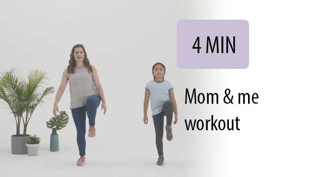 woman and daughter lifting one knee in the air and smiling