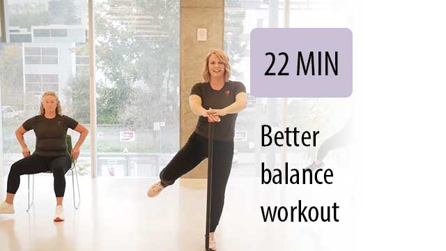 instructor leading seated student on balance techniques